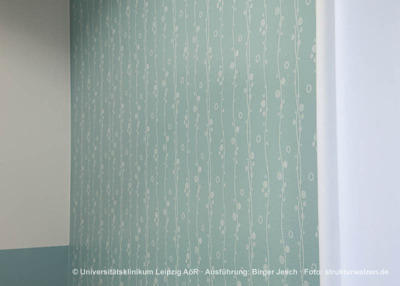 light blue wall with round stripe pattern