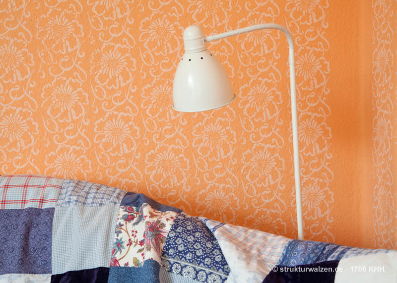 orange wall with flower pattern