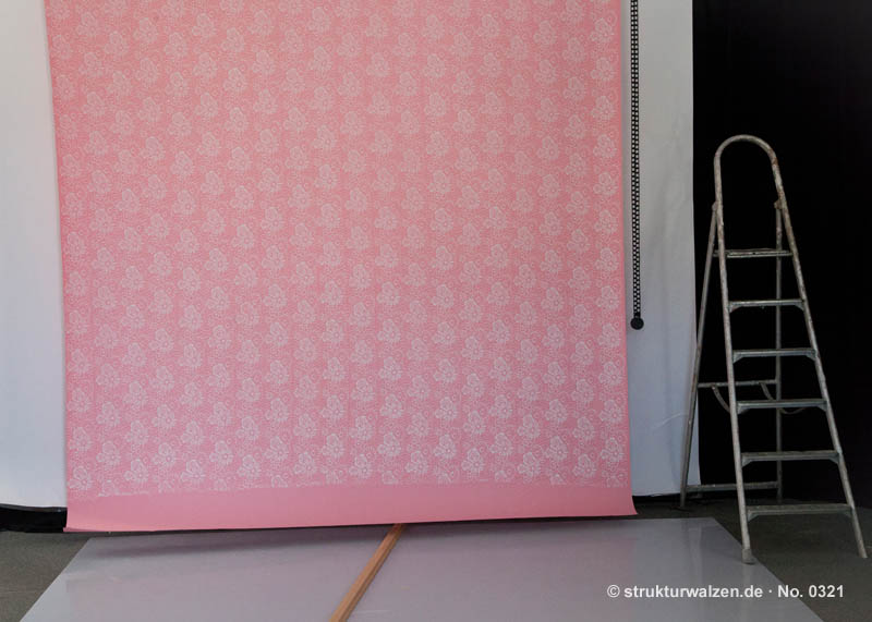 pink background in photo studio with rolled pattern